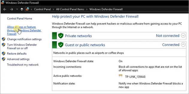 Click Allow an app or feature through Windows Defender Firewall